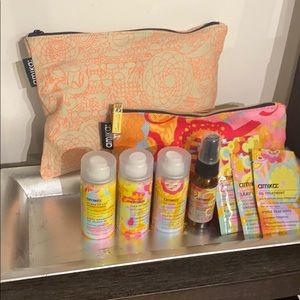 Amika travel hair care items with 2 travel bags.